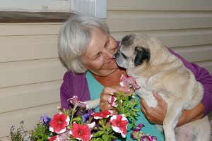 Woman enjoying time with dog